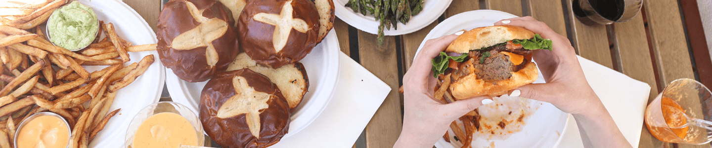 Picnic table of BBQ plated on Chinet Classic plates