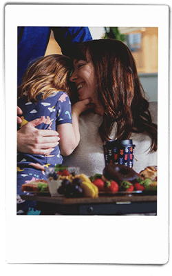 Instax picture of a mother hugging her daughter