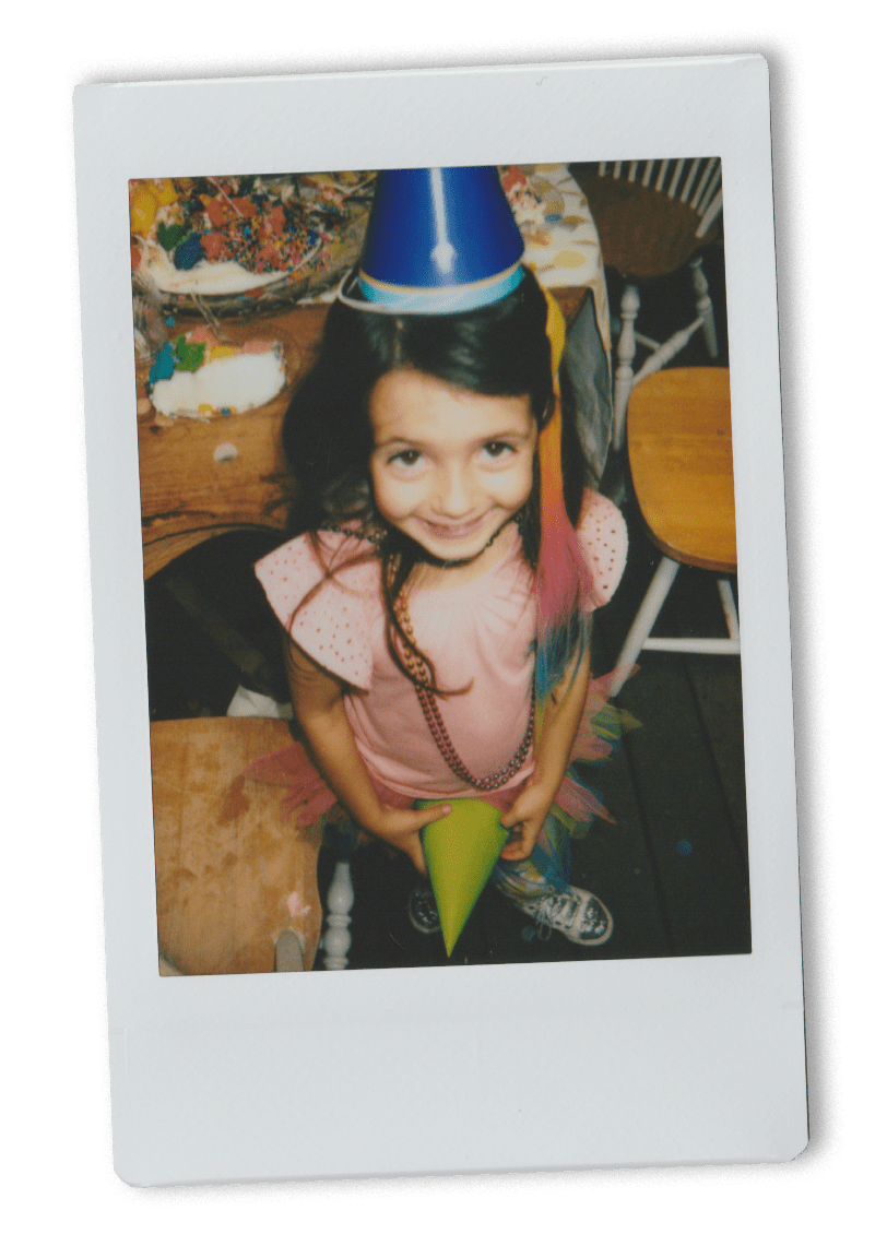 Instax picture of a little girl at a birthday party