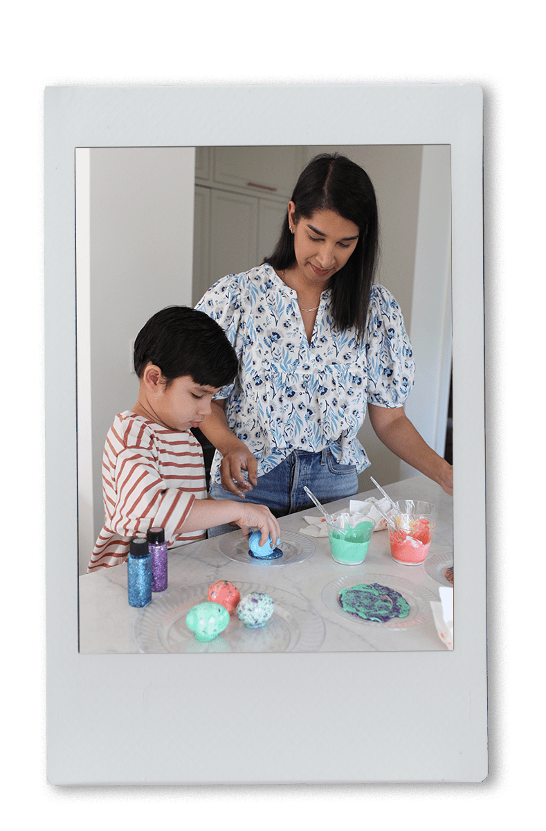Instax of Mom & Son Dyeing Easter Eggs