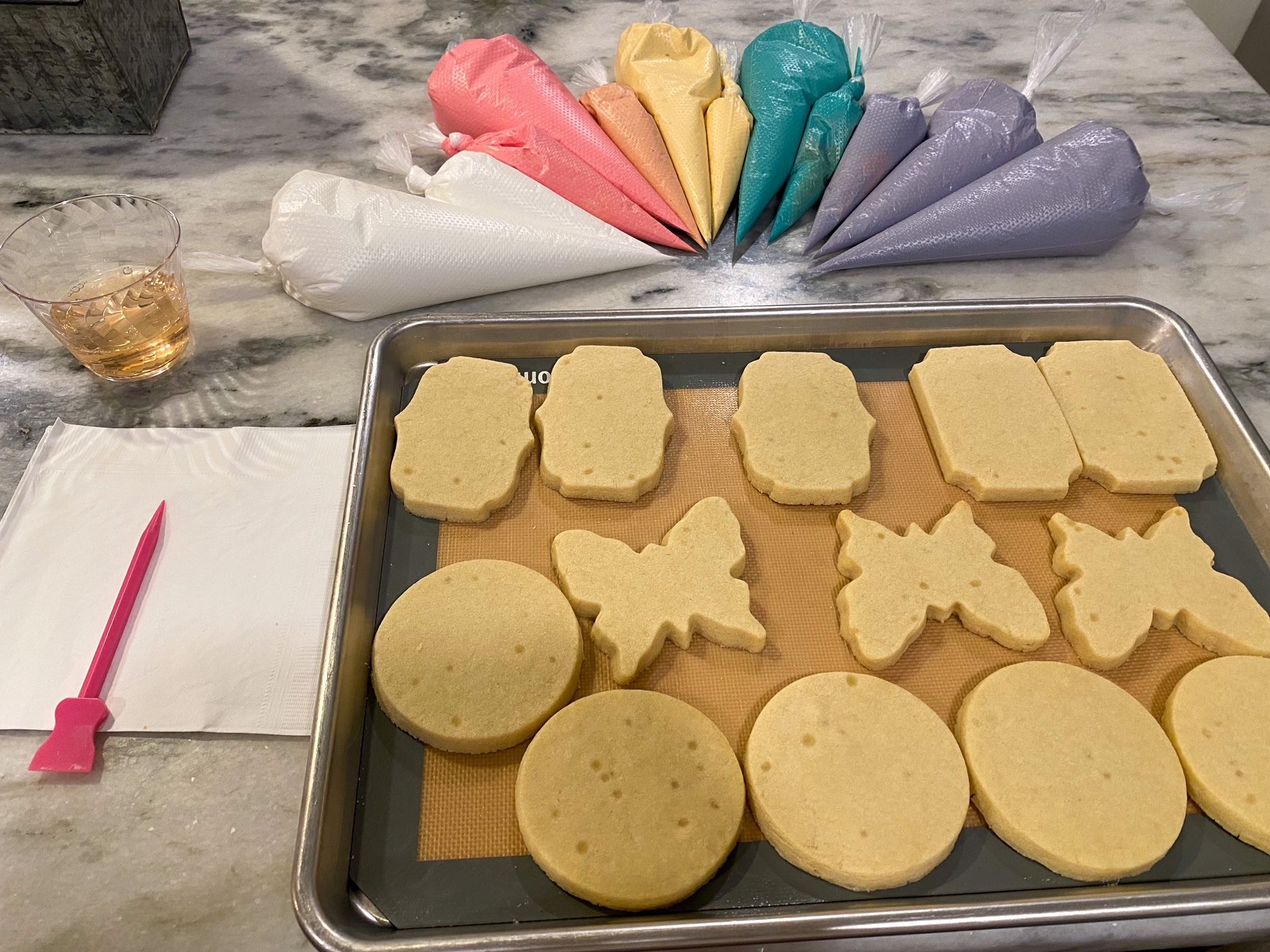 Undecorated cookies on a baking sheet