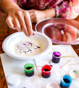 Dripping food coloring in icing