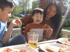 Family enjoying pizza