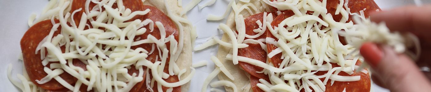 Preparing waffle iron pizza