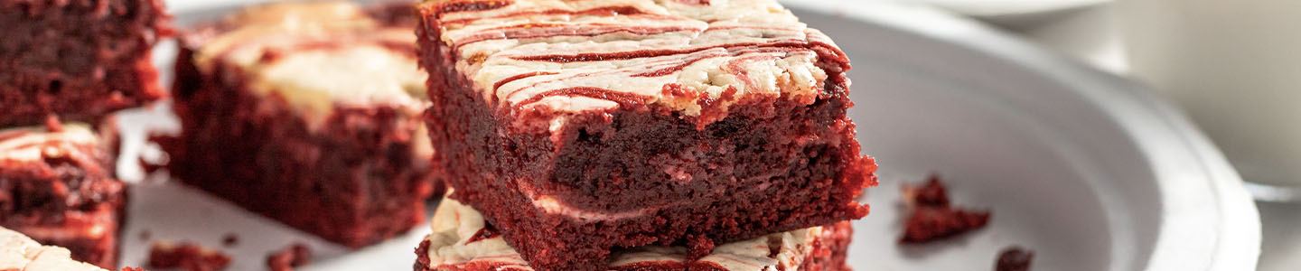 Red velvet cheesecake brownies on a Chinet Classic platter