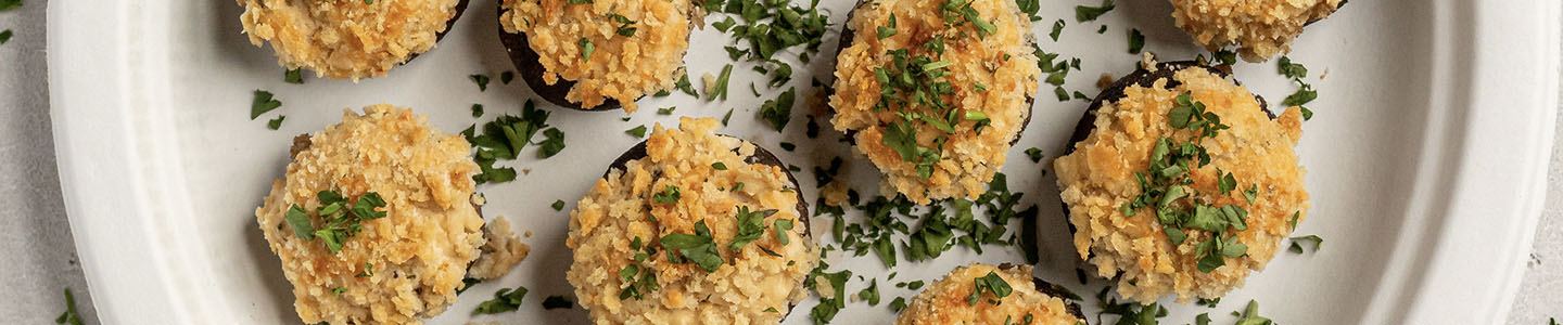 Stuffed mushrooms served on a Chinet Classic plate