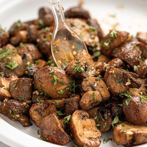 Air fryer mushrooms served on a Chinet Classic plate