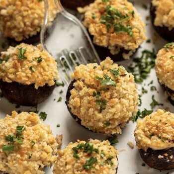 Stuffed mushrooms served on a Chinet Classic plate