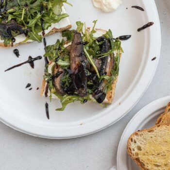 Mushroom toast served on Chinet Classic plate