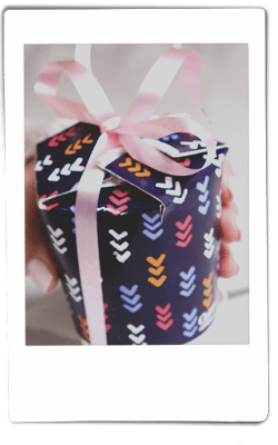 Instax picture of a Chinet Comfort cup cut and folded to hold a cupcake