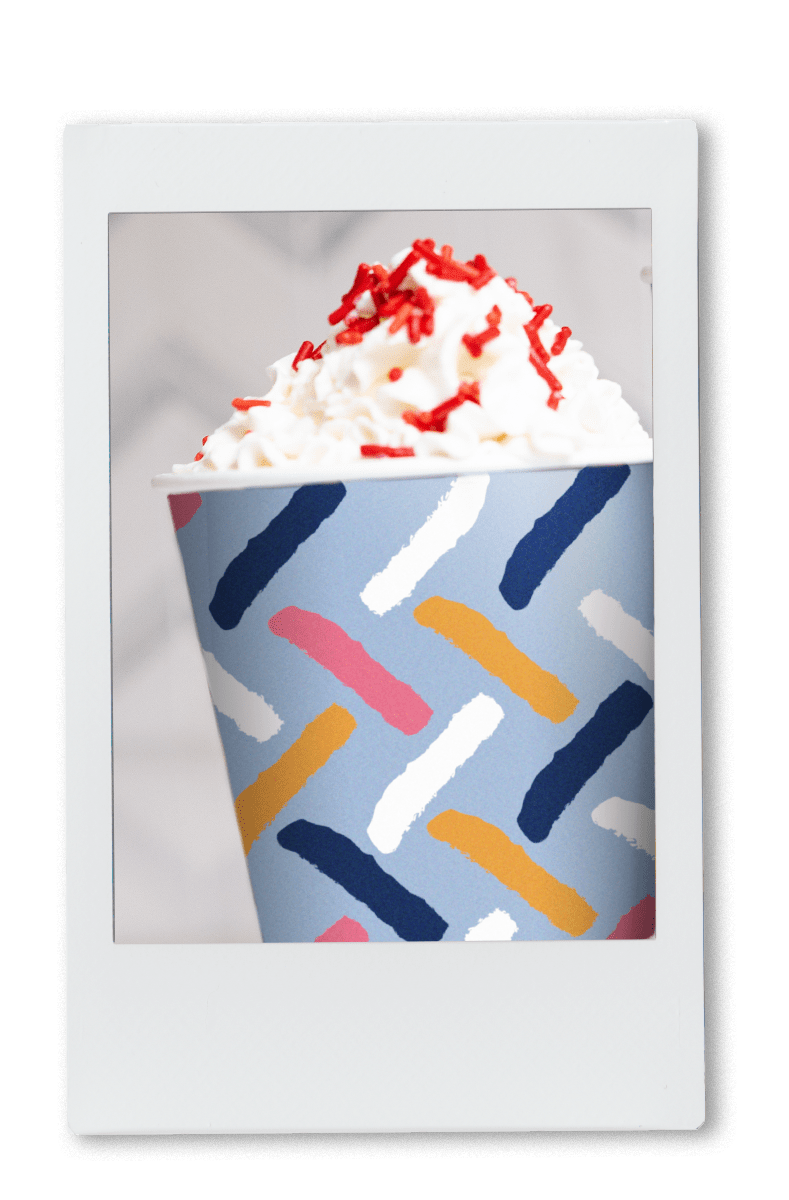 Instax of red velvet hot chocolate with whip cream in chinet comfort cup
