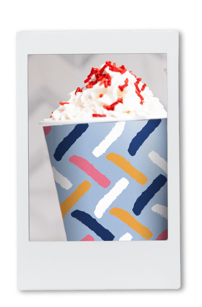 Instax of red velvet hot chocolate with whip cream in chinet comfort cup