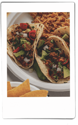 Ground mushroom tacos with rice on Chinet Classic® plate