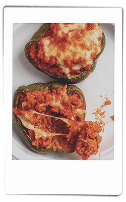 Instax crawfish stuffed bell peppers served on a Chinet Classic plate