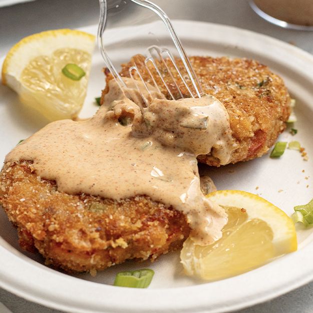 Crawfish cakes served on a Chinet Classic plate