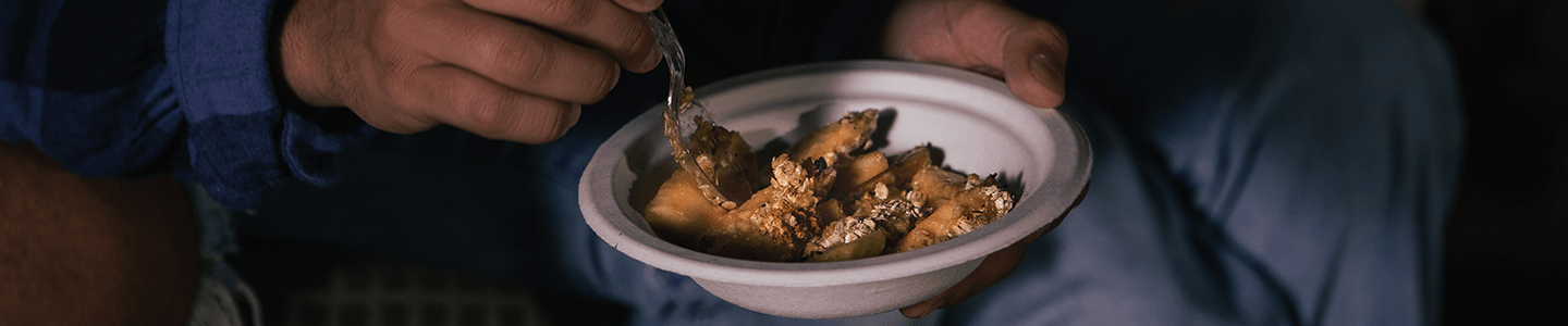 Eating apple crisp out of a Chinet Classic® Bowl