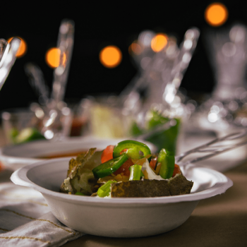 Fully loaded baked potato in a Chinet classic bowl