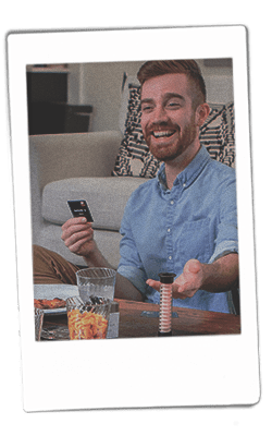 Instax of guy laughing playing cards