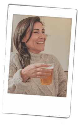 Instax picture of a woman drinking from a Chinet Crystal cup