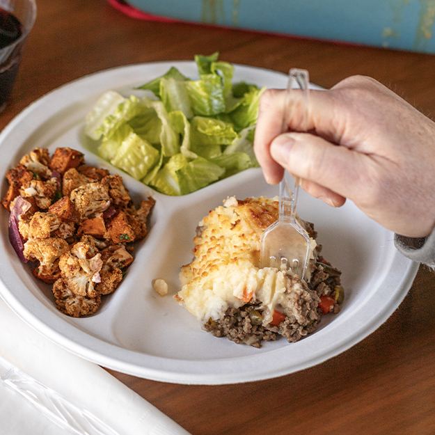 Meal served on a Chinet Classic compartment plate