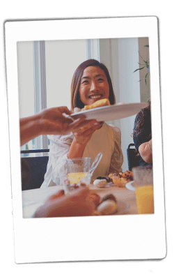 Instax of girl sharing food on a chinet plate
