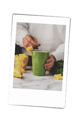 Instax of Kale-Pineapple Smoothie in a chinet cup