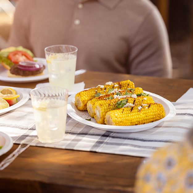 Plate of corn served on a Chinet Classic platter