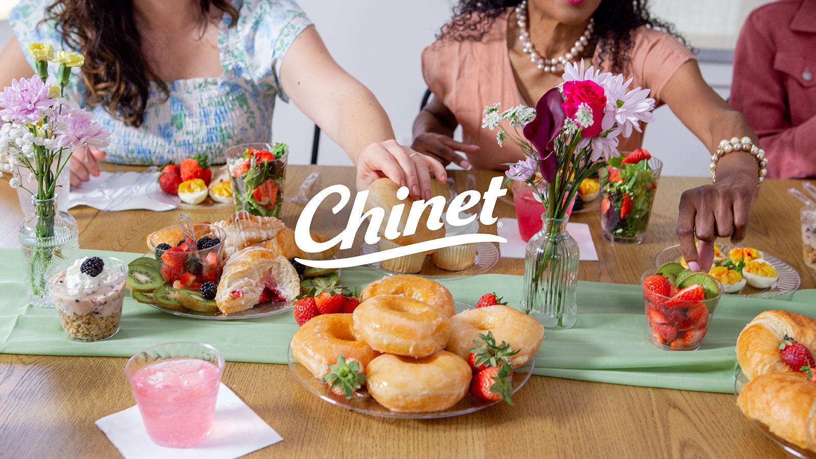 Brunch Video Thumbnail - A brunch spread on a dining table with the Chinet brand logo in the middle.