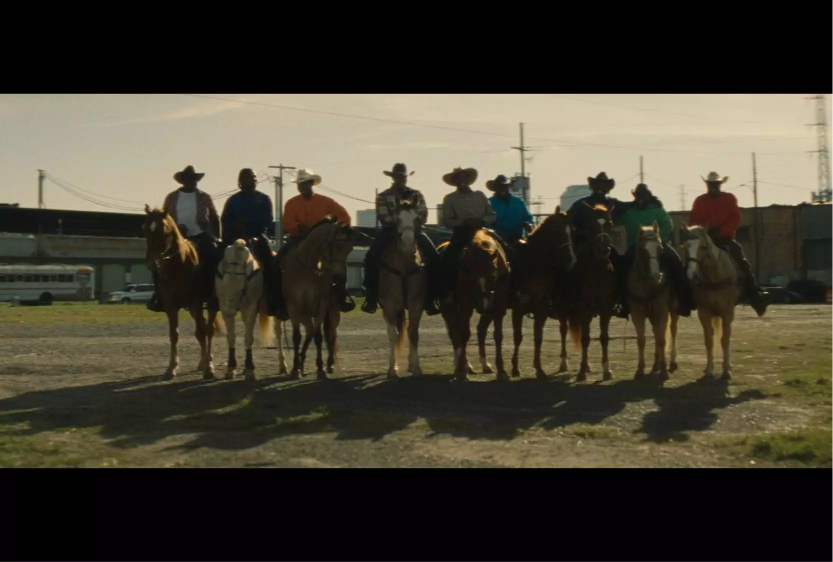 Eight men on horseback