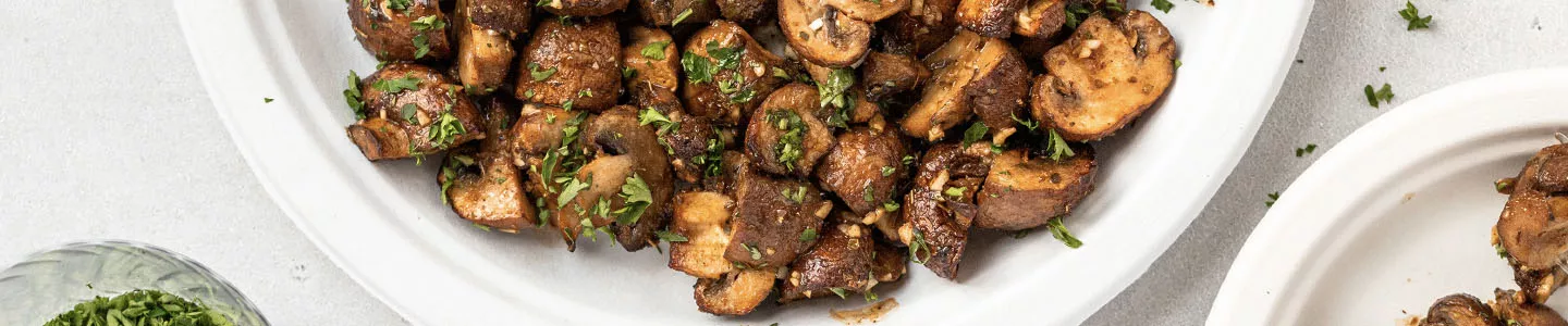 Air fryer mushrooms served on a Chinet Classic plate