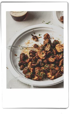 Instax picture of air fryer mushrooms served on a Chinet Classic plate