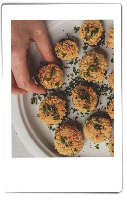 Instax picture of stuffed mushrooms served on a Chinet Classic plate