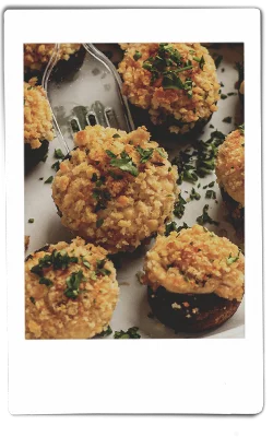 Instax picture of stuffed mushrooms served on a Chinet Classic plate