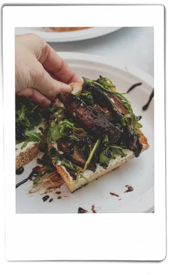 Instax picture of mushroom toast served on Chinet Classic plate