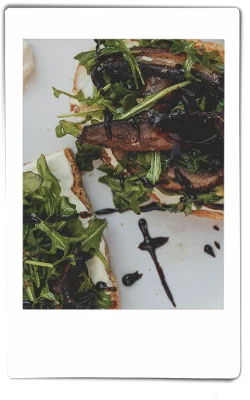 Instax picture of mushroom toast served on Chinet Classic plate