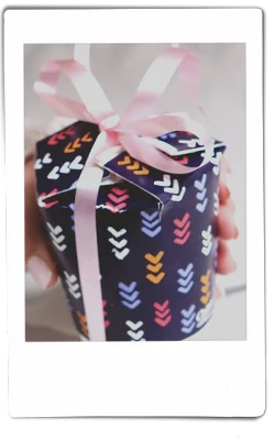 Instax picture of a Chinet Comfort cup cut and folded to hold a cupcake