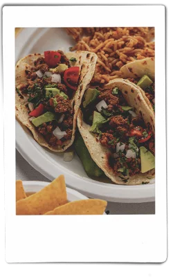 Ground mushroom tacos with rice on Chinet Classic® plate