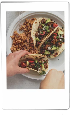 Ground mushroom tacos with rice on Chinet Classic® plate