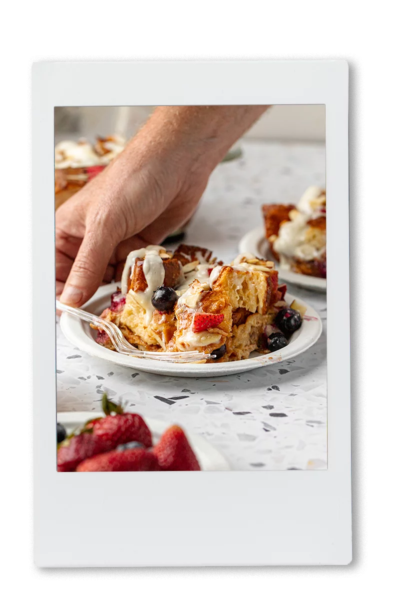 Instax picture of a slice of mixed berry croissant bake served on a Chinet Classic dessert plate