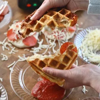 Waffle pizza pulled apart by hands